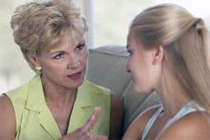 mom talking with daughter about feelings