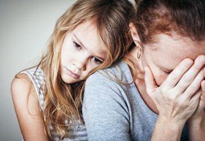 woman and daughter having grieving feelings