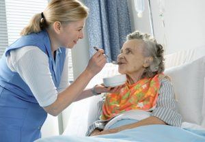 Grandma eating with palliative care